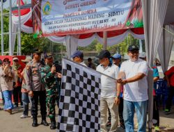 Meriahkan HUT RI Ke 80, Sekda Achmad Washil Lepas Peserta Gerak Jalan Wadeng – Sidayu
