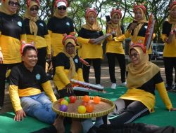 Waduk Bening Saradan Jadi Panggung Kreativitas, Ketua TP-PKK Kabupaten Madiun Berhasil Menarik Perhatian di Perlombaan Tradisional